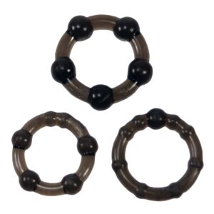 A set of black and gray rings with black beads.
