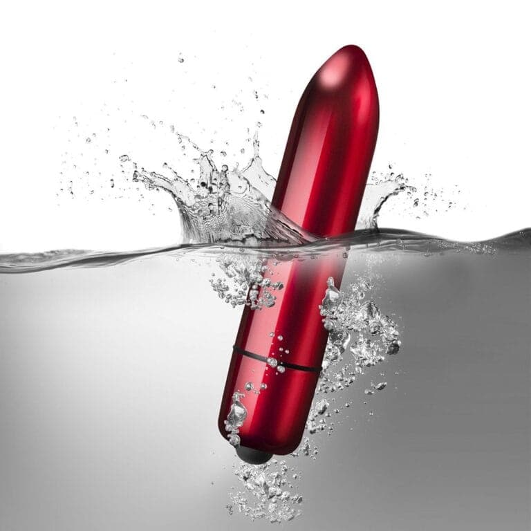 Vibrator submerged in water for waterproof pleasure and intimacy enhancement.