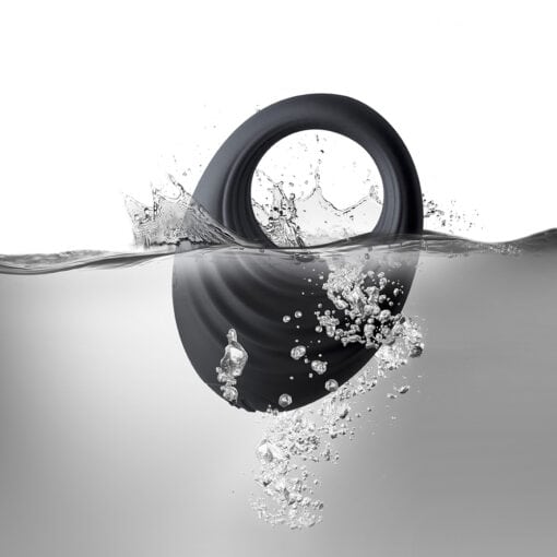 A black ring floating in the water.