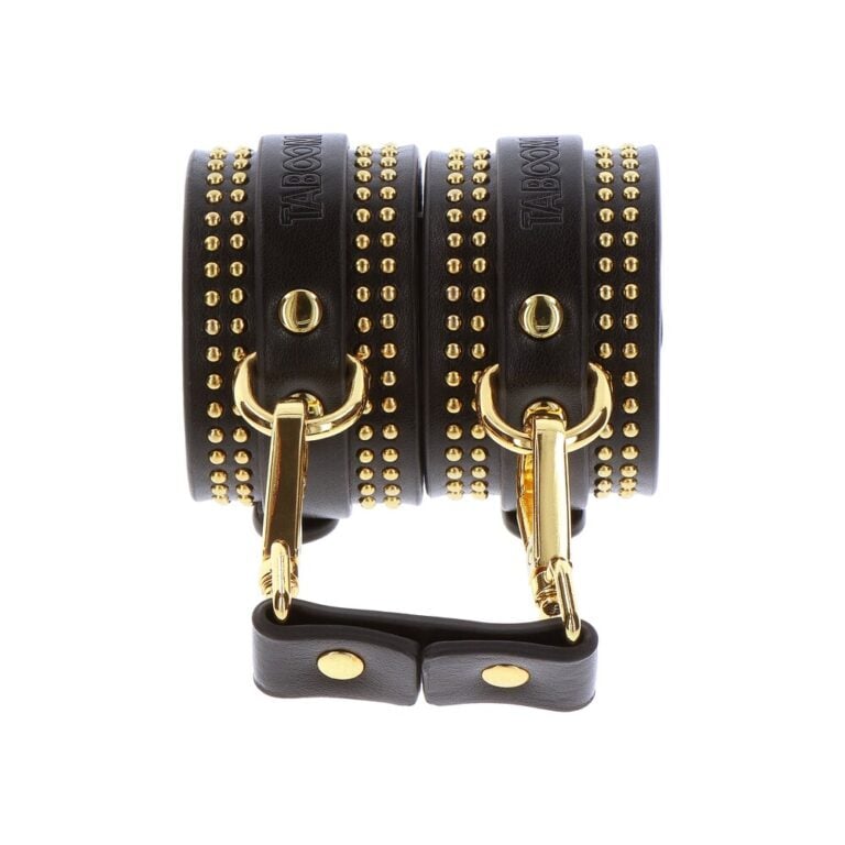 Enhanced BDSM leather cuffs with gold studs and buckles, designed for bondage and fetish play. Durable, stylish, and adjustable for comfortable restraint experiences.