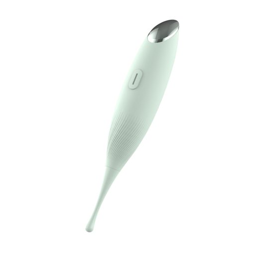 A white electric toothbrush on a white surface.