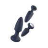 A pair of black and white sex toys on a white background.