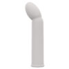 A white sex toy on a white background.