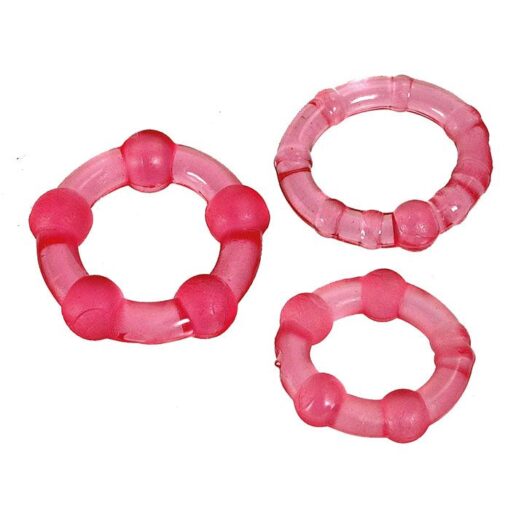Three pink plastic rings on a white background.