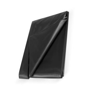 A black plastic sheet folded on top of a white surface.