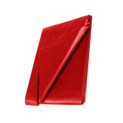 A red sheet folded on top of a white background.