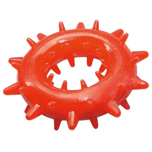 A red plastic ring with spikes on it.
