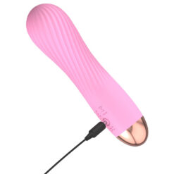 Vibrating sex toy designed for female pleasure, featuring a sleek pink design with textured surface for enhanced stimulation. Ideal for intimate use and personal satisfaction.