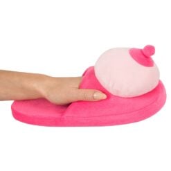Soft pink plush slipper featuring a heart-shaped embellishment, designed for comfort and playful aesthetics. Made from plush material, this slipper is perfect for relaxing at home or as a fun gift for.