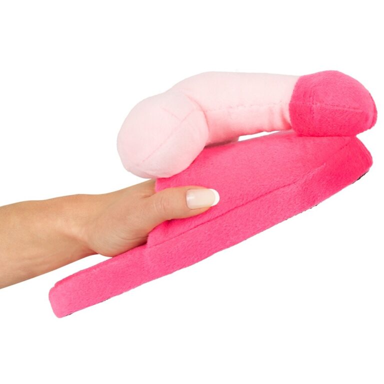 Close-up of a pink plush sex toy designed for adult pleasure, featuring a realistic shape and soft texture for enhanced comfort and stimulation.