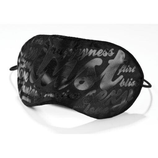 A black eye mask with words on it.