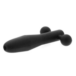 A black sex toy on a white background.