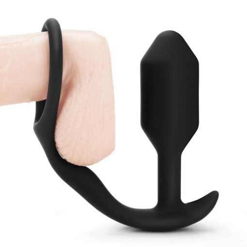 A black sex toy with a black handle.