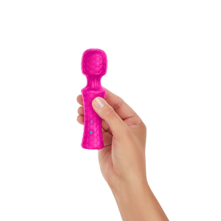 Pink textured vibrator for women, ergonomic design, and pleasure enhancement.