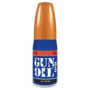 A bottle of gun oil on a white background.