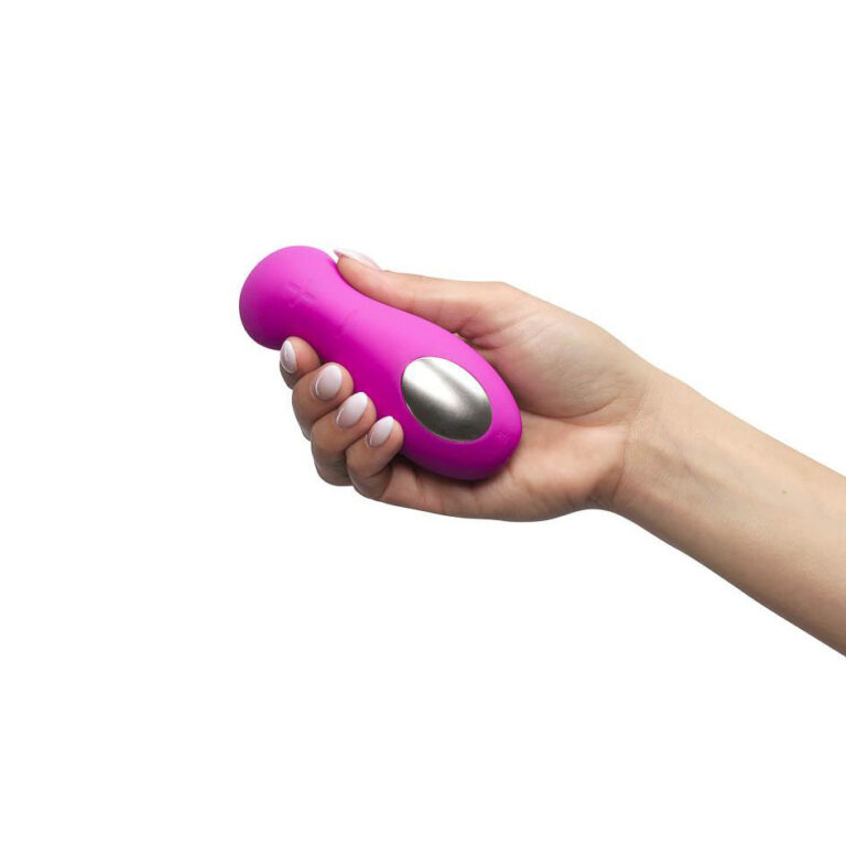 13 sex tech games that work for solo players, couples and groups Hand holding a pink pleasure vibrator with silver accent, designed for intimate use, showcasing modern sextech products for enhanced pleasure and personal wellness.