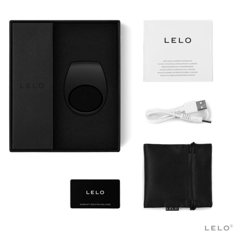 High-quality LELO Smart Wand vibrator with sleek design, USB charging cable, user manual, warranty card, and storage pouch for discreet use. Perfect for intimate pleasure and personal wellness.