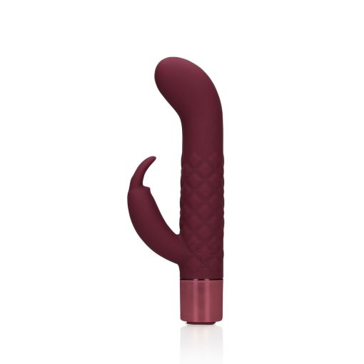 A burgundy sex toy on a white background.