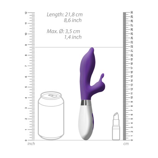 A purple sex toy next to a measuring tape.