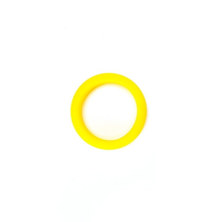 A bright yellow silicone ring designed for sexual wellness, offering enhanced pleasure and intimacy. Perfect for couples seeking innovative sextech products to improve their experience.