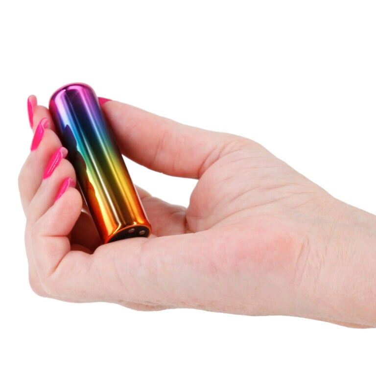 Small rainbow-coloured vibrating bullet sex toy held in hand, ideal for discreet pleasure and intimacy enhancement, perfect for adult toy enthusiasts.