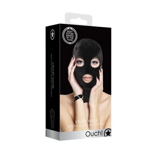 A woman wearing a black mask in a package.
