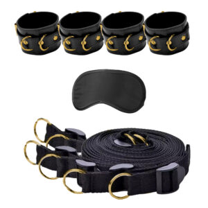 A set of black leather cuffs and a pair of eye goggles.