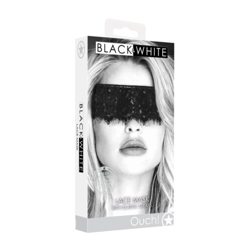 A black and white eye mask with a woman in it.