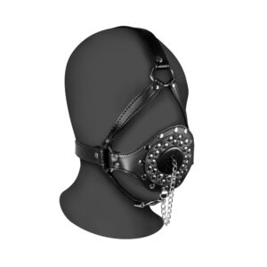 A mannequin with a black leather muzzle.