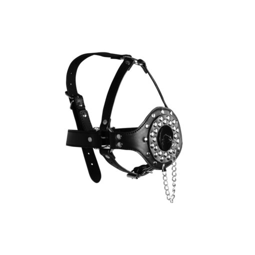 A black leather muzzle with a chain attached to it.