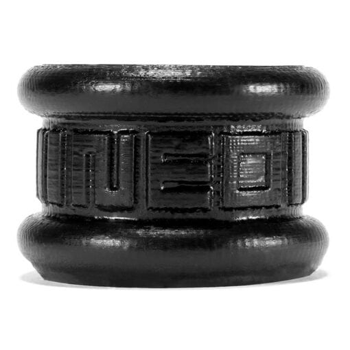 A black wooden cuff with a design on it.