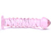 A pink glass sex toy on a white background.