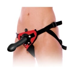 A woman wearing a harness with a black and red dildo.