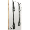 A pair of black straps hanging from a door.