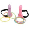 A pair of pink and purple rubber rings with a dildo.