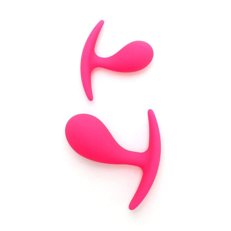 Dual-ended pink vibrator designed for versatile pleasure, featuring ergonomic curves for targeted stimulation and comfort. Perfect for exploring intimate sensations and enhancing sexual wellness.