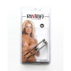 An image of Rimba Bondage Play handcuffs in packaging, featuring a model with blonde hair. Ideal for BDSM and adult intimacy accessories, emphasizing safety and pleasure.