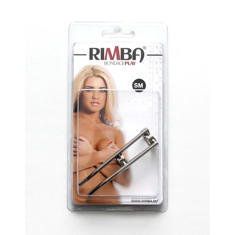 An image of Rimba Bondage Play handcuffs in packaging, featuring a model with blonde hair. Ideal for BDSM and adult intimacy accessories, emphasizing safety and pleasure.
