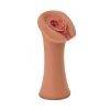 An image of a sex toy with an open mouth.