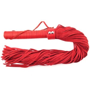 A red leather whip with a handle on it.
