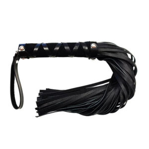 A black leather whip with tassels on it.