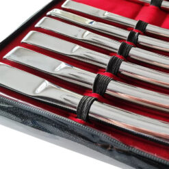 High-quality stainless steel knives with black handles, stored in a red-lined case for professional or home use. Perfect for culinary enthusiasts seeking durable, sharp kitchen tools.