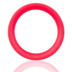 A red ring on a white surface.