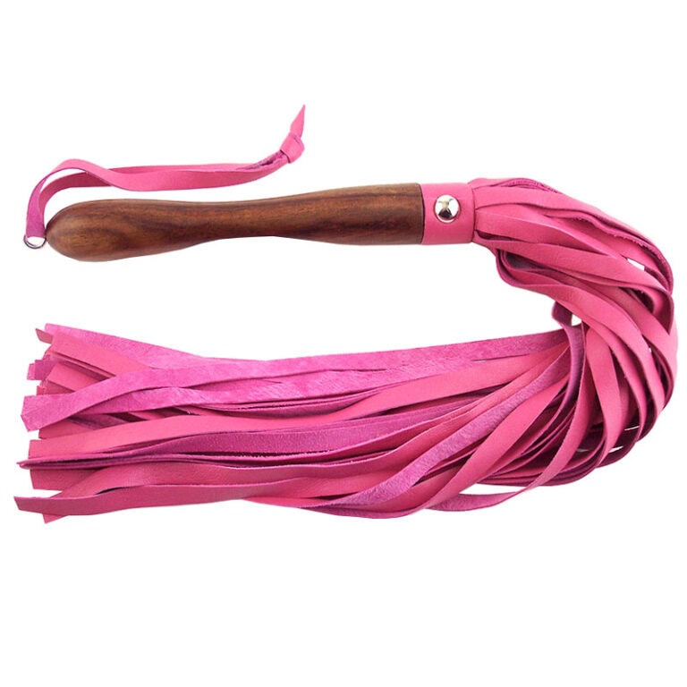 Pink leather flogger for adult intimacy and BDSM play, featuring a wooden handle and multiple leather strands for enhanced sensation and stimulation.