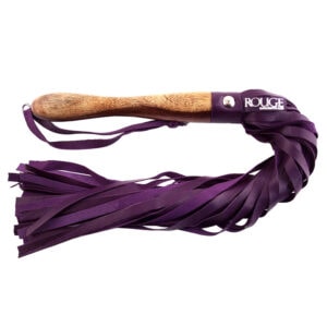 A purple leather whip with a wooden handle.