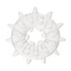 A white plastic ring with spikes on it.
