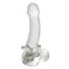 A clear glass dildo dangling on a white background.