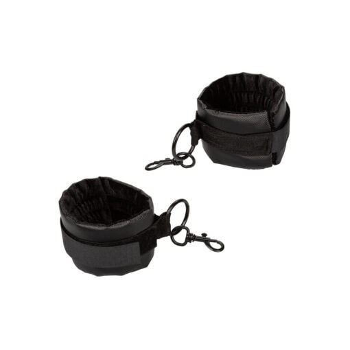 A pair of black wrist cuffs on a white background.