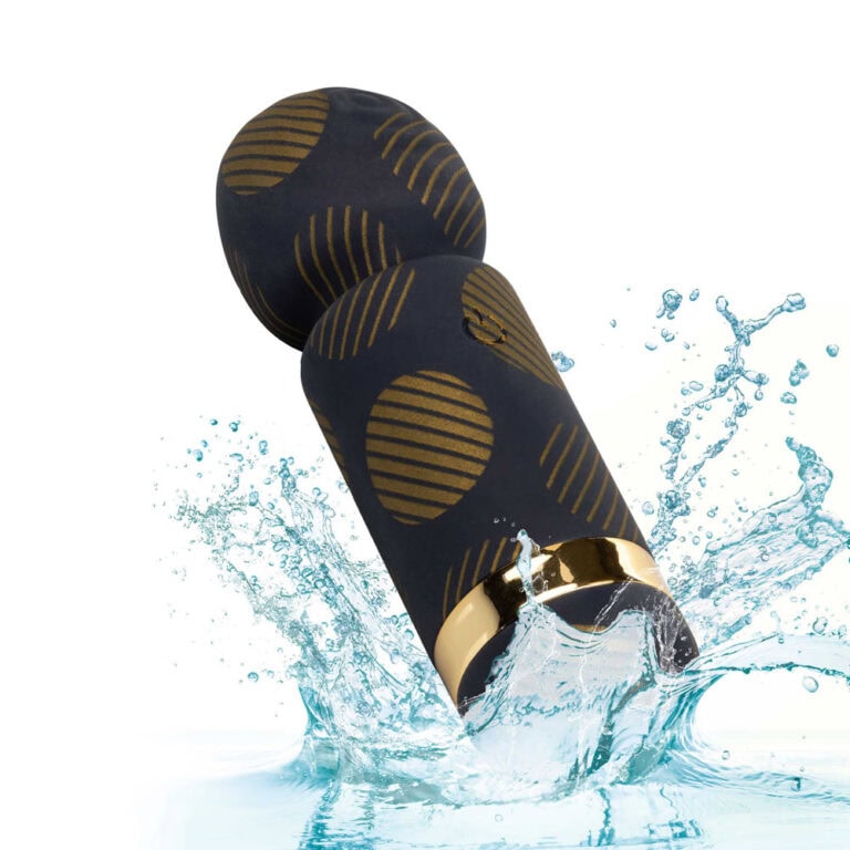 An innovative waterproof vibrator featuring a sleek black design with gold accents, perfect for versatile pleasure and easy cleaning.