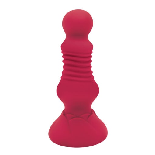 A red sex toy on a white background.